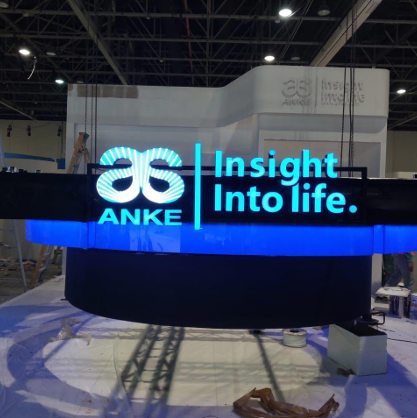 Blue LED illuminated 3D exhibition stand signage for ANKE Insight Into Life at Dubai expo